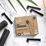 Edinco Oral B compatible toothbrush heads in charcoal color with box and activated charcoal pieces