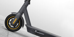 Edinco Segway Ninebot MAX G30 Gen 2 scooter close-up featuring a sleek gray design and yellow accents
