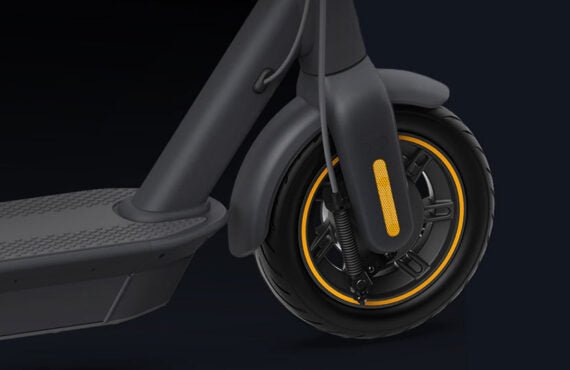 Close-up of the Edinco Segway Ninebot MAX G30 Gen 2 scooter front wheel with yellow accents