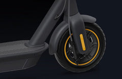 Close-up of the Edinco Segway Ninebot MAX G30 Gen 2 scooter front wheel with yellow accents