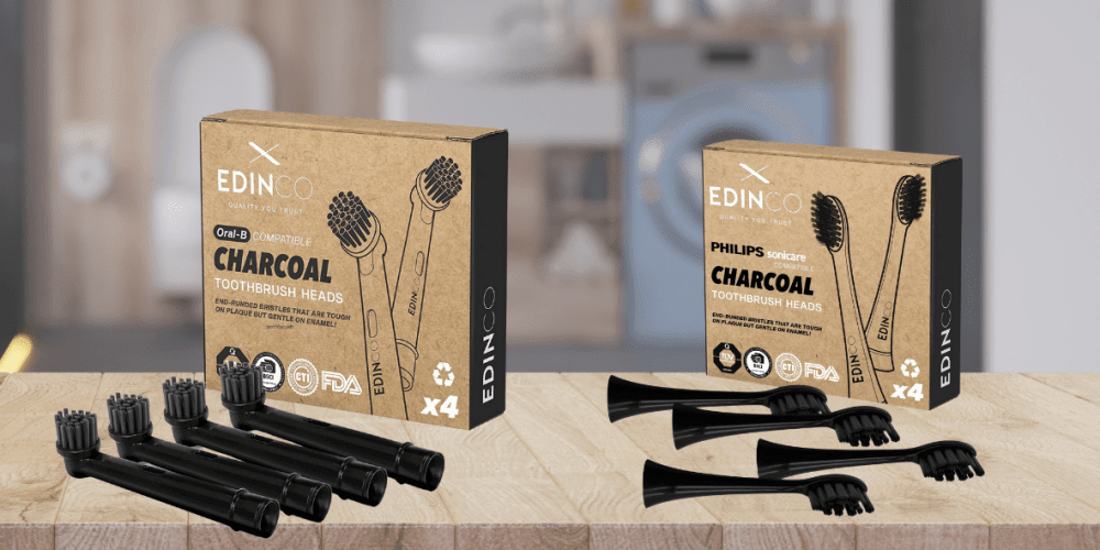 Edinco recyclable Oral-B and Sonicare brush heads — two boxes with four heads each on a bathroom surface