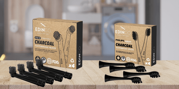 Edinco recyclable Oral-B and Sonicare brush heads — two boxes with four heads each on a bathroom surface