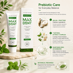 A promotional graphic for Prebiotic Max Dent plant-based toothpaste. The image shows a white tube and matching box of the toothpaste on a light beige background with botanical illustrations, green leaves, and text detailing the prebiotic care ingredients and benefits.