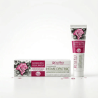Product display of Rose Rio Dental Program Damascena Rose Water Homeopathic Toothpaste with aromatherapy care. A white and pink box sits next to a standing squeeze tube against a clean white background, distributed in the UK by Edinco