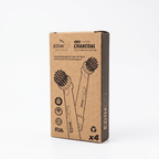 Front view of Edinco eco-friendly brown kraft paper box for the 4-pack charcoal toothbrush heads compatible with Oral-B