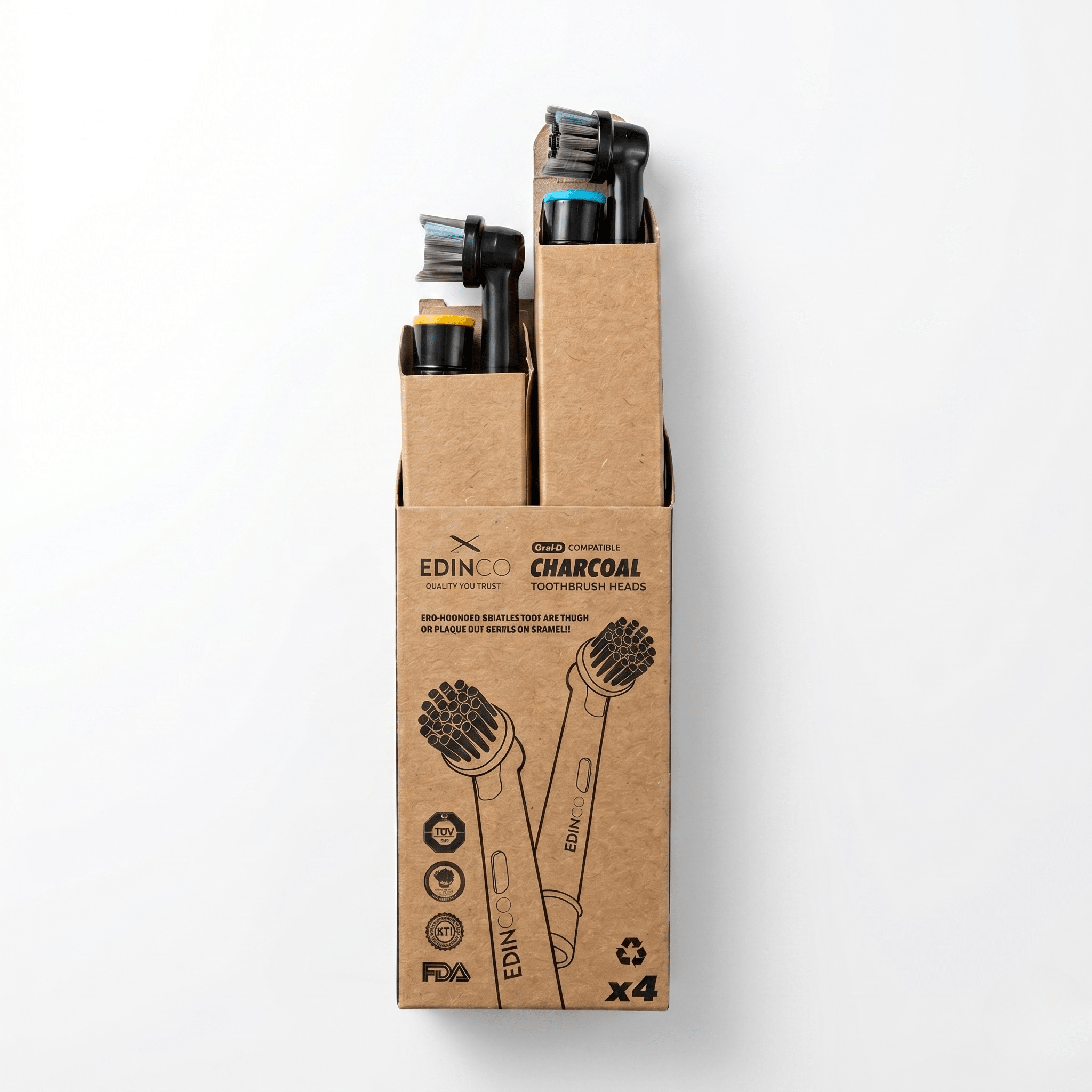 Sustainable cardboard packaging of Edinco charcoal toothbrush heads with contents displayed inside the box on a white background