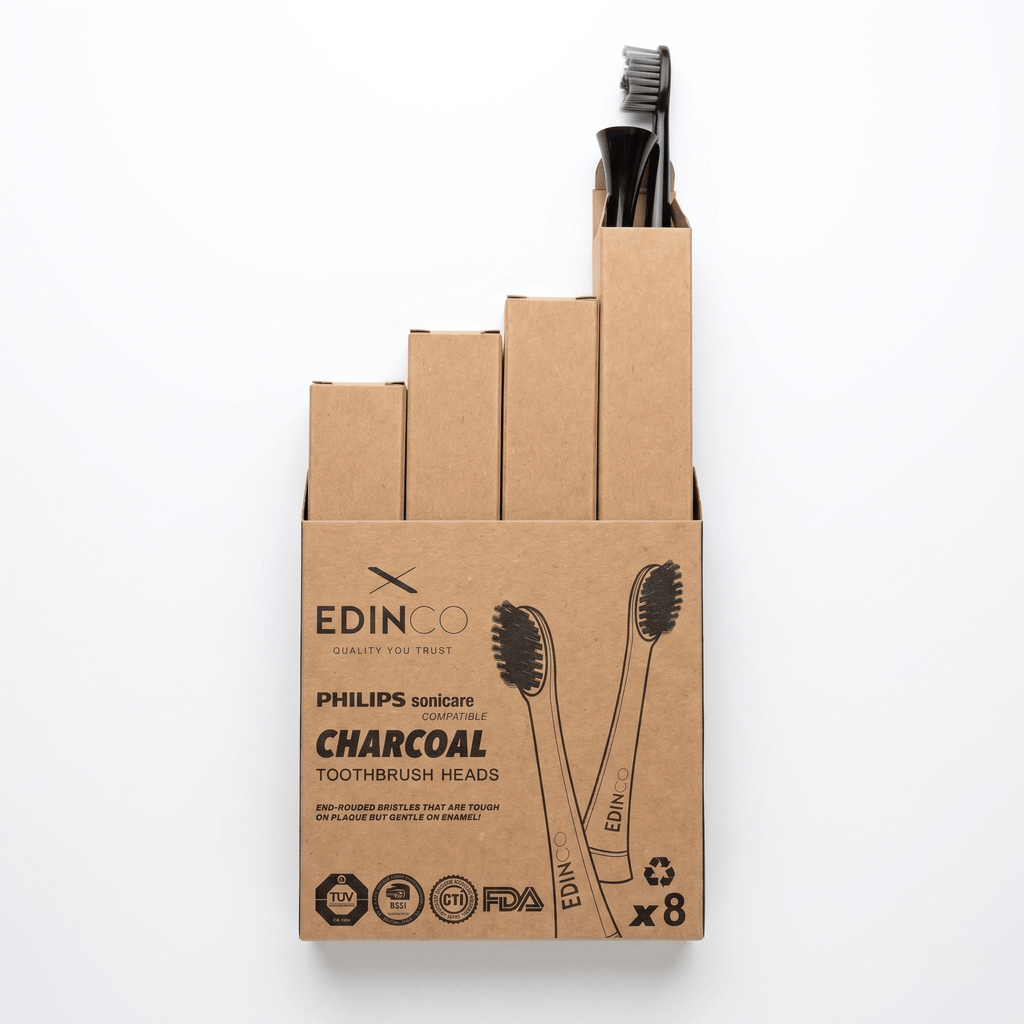 Main packaging of Edinco 8-pack recyclable charcoal multipack compatible with Philips Sonicare, featuring one replacement head outside the inner box.